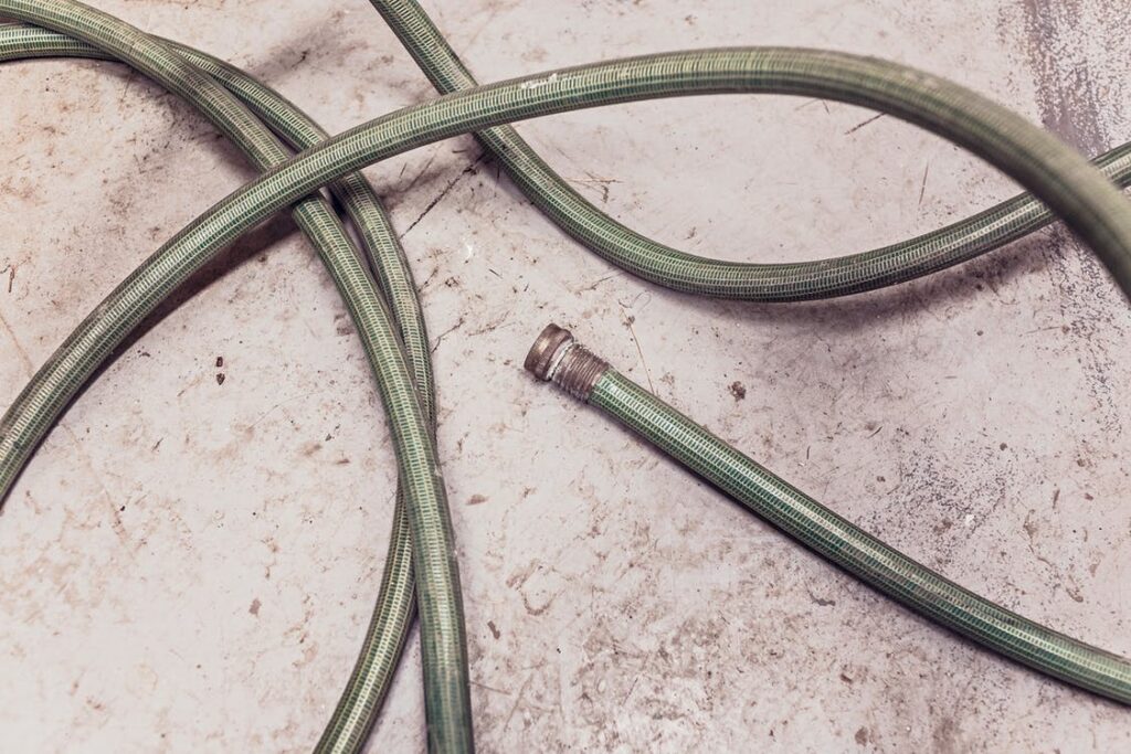 A hose that needs straightening out before installation.